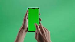 Hand Tap Touch Green Screen Smartphone On The Green Screen Background