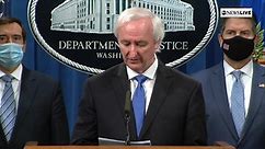 Justice Dept. holds a news conference