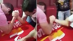 Snap! Bone-chilling moment man's arm breaks during arm-wrestle
