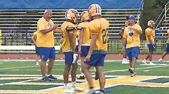 East Meadow coaches work to connect with players on the field and classroom