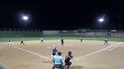 Coach draws up a cheap shot for umpire during softball game
