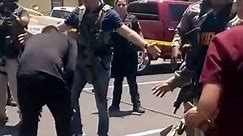 Distraught mother claims police handcuffed her in chaos outside school shooting