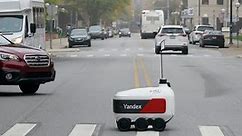 Robots roam some campuses and city streets as contactless food delivery grows