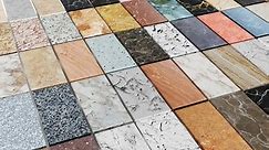 Close shot of countertops granite and marbles made of stone slab. Kitchens and bathrooms countertop selection. 3d visualization shot of samples.