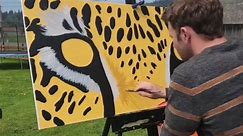 Artist unleashes a leopard's elegance in SPOT-acular painting