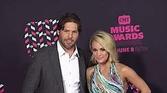 Carrie Underwood and Mike Fisher attend the 2016 CMT Awards