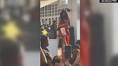 WATCH: Concertgoer threw drink at Cardi B during performance but rapper responds