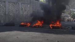 Haiti declares a curfew as it tries to restore order after weekend jailbreak