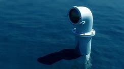 Submarine periscope appears from the ocean.