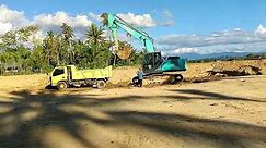 Kobelco SK200 and Sany SY215C Excavators Dig Soil for Toll Road Project Success
