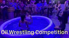 Oil Wrestling Competition at 69 Rock Bar