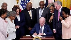 Biden signs bill into law making Juneteenth a national holiday