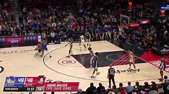 Stephen Curry drains the wild and-one