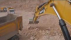 SANY Excavator TO TRUCKS LOADING STONES