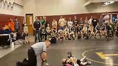 Toddler interrupts wrestling match to 'save' older sister