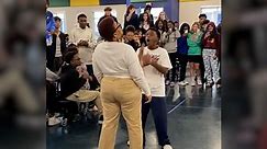 Students erupt as teacher battles 8th grader in dance-off