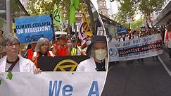 Climate protestors block traffic in Melbourne's CBD during peak hour