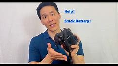 Swollen, stuck battery inside a camera! Yikes...