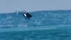 Watch moment helicopter crashes in lake