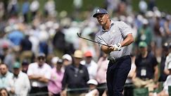 DeChambeau opens with 65 to lead the Masters
