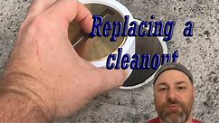 Replacing a cleanout plug in a concrete driveway
