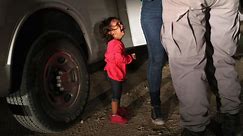 Border agent speaks out on crying girl photo
