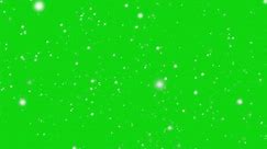 Download Blur bokeh abstract glittering snow particles falling from top on the green screen for free