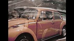 UNITED STATES - CIRCA 1970s: A convertible peels away through a dirt path. A woman drives an orange VW Beetle. A young woman drives a convertible. A brown, covered convertible drives down a street.