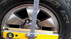Homemade laser wheel alignment tracking device