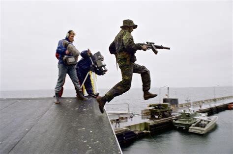 frogman   danish frogman corps navy sof jumps   rooftop