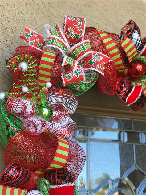 outdoor christmas garland with lights red and green
