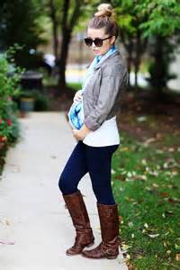 she s rocking the leggings and boots while pregnant bump