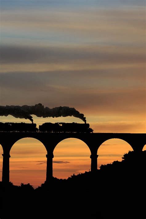 steam engines in tandem making some tracks pinterest trains silhouette and sunsets