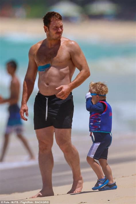chris pratt shows off biceps and ripped abs in honolulu