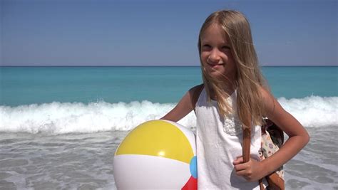 cute blonde model in swimsuit playing with a beachball stock footage video 4602344 shutterstock