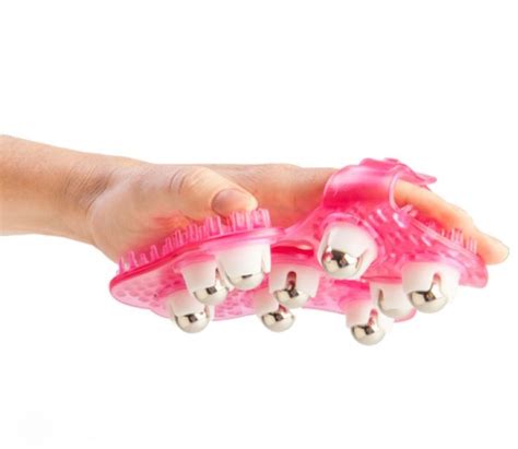 massage glove pink in colour stainless steal ball bearings