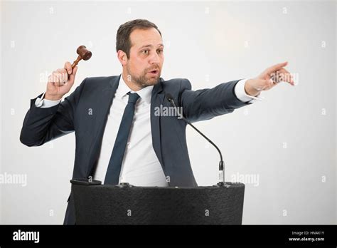 male auctioneer  action holing  gavel    auction stock photo alamy
