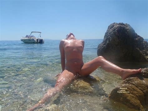 nude wife sitting on rocky beach july 2011 voyeur web hall of fame