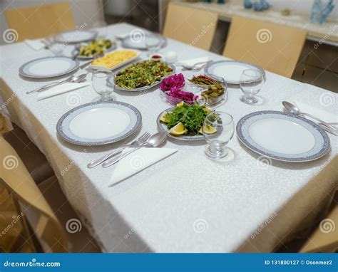 table layout prepared  dinner  turkish family house plate fork spoon  salad dishes