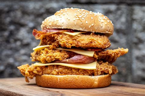 kfc launches  triple stacker burger   secret menu newscomau