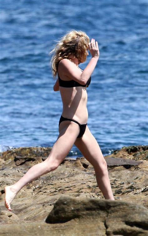 ke ha running around bondi beach in bikini photos