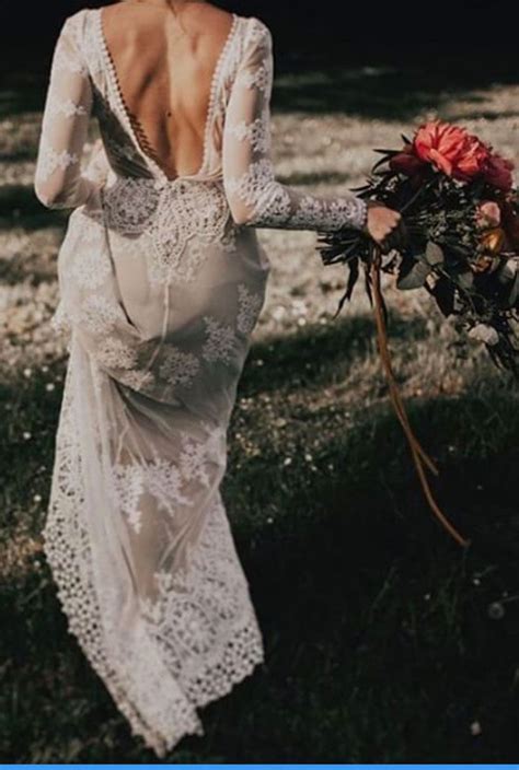 long sleeve wedding dress with open back perfect for winter wedding