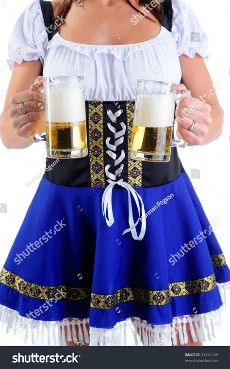 Beautiful Woman Wearing A Traditional Dirndl Costume For
