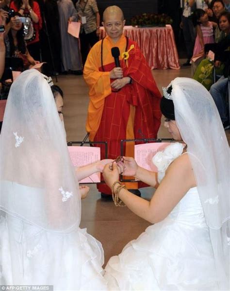 lesbian couple celebrate taiwan s first buddhist same sex wedding prayer beads buddhists and