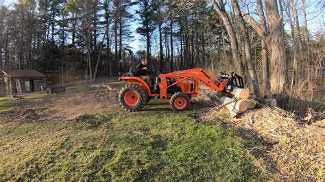kubota  compact tractor   grapple  chipper  remove  clean  brush townline