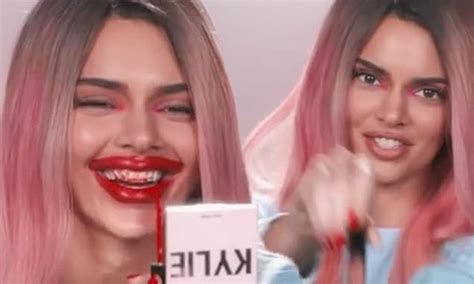 Kendall Jenner Smears On Gloss And Mocks Kylies Inflated Lips