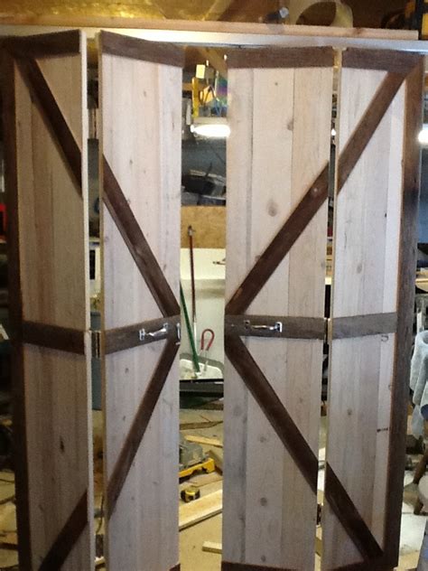 double bi fold barn doors opened  art folder pinterest doors