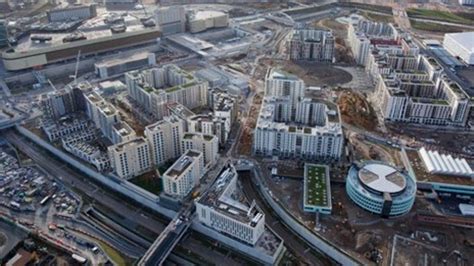 london 2012 olympic village handed over to organisers bbc news