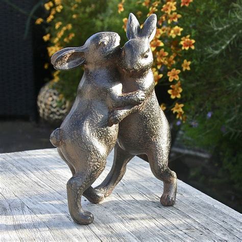 dancing rabbits garden sculpture  london garden trading