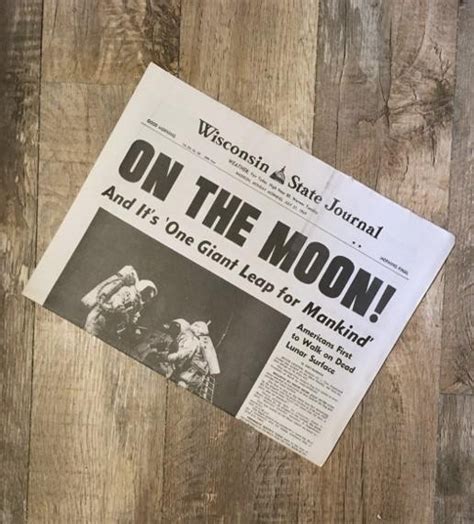 moon landing newspaper covering apollo  mission